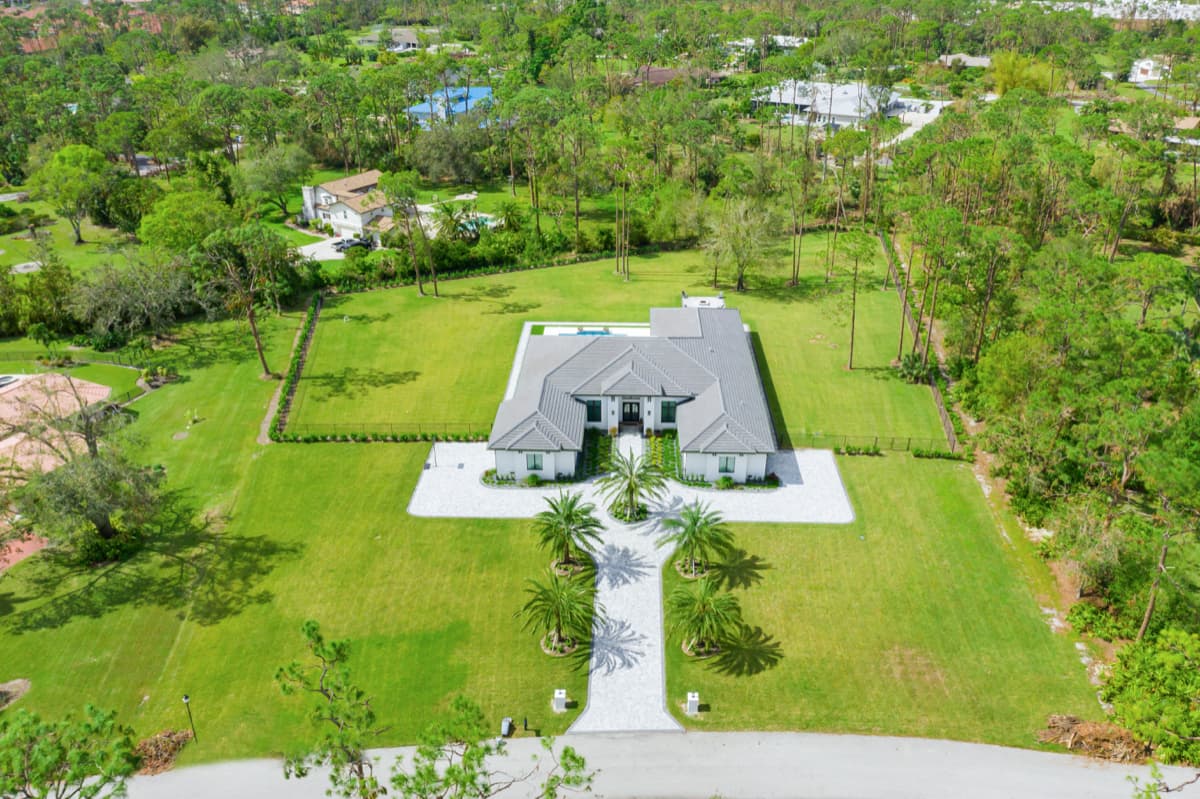 Aerial view showing property expanse